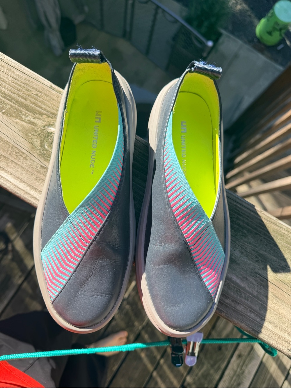 United Nude Charcoal Slip-On Flats with Neon Yellow and Teal-Pink Stripes